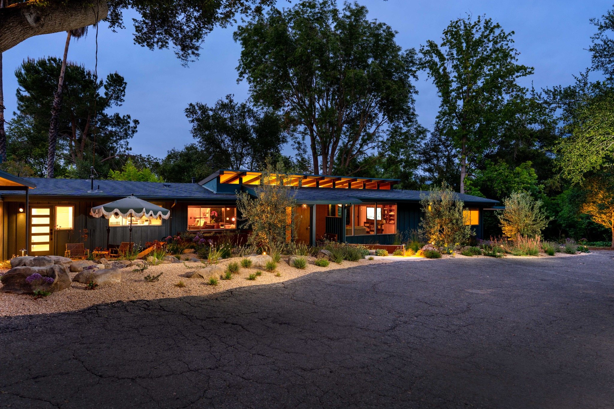 Twilight view of the Mid-Century Modern residence
